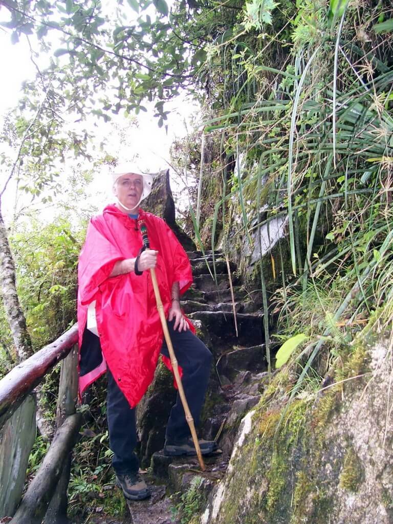 Bob climbs steps on the Inca Trail near Wiñay Wayna in Peru, South America