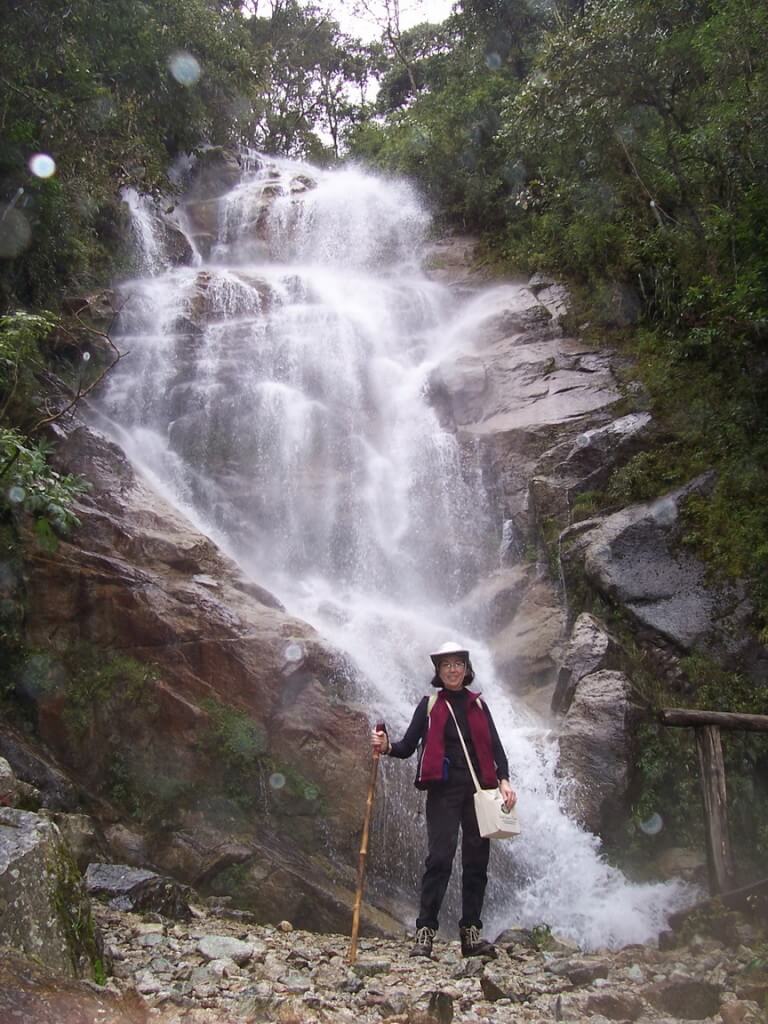 Jean at the waterfalls near the Wiñay Wayna ruins on the Inca Trail in Peru, South America
