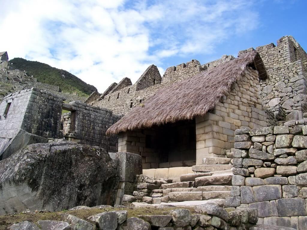 An image of a restored roofed building at Machu Picchu in Urubamba Province, Peru.