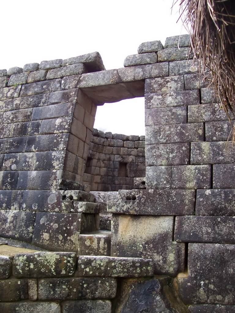 An image of the window in the Tower of the Sun at Machu Picchu in Urubamba Province, Peru.