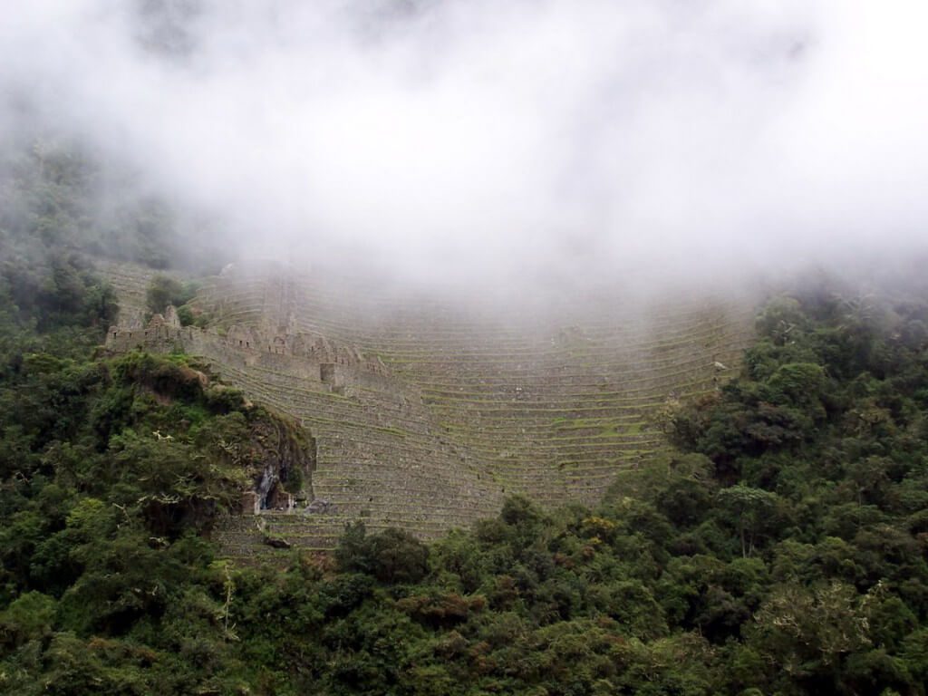 Mist over the terraces at Wiñay Wayna in Peru, South America