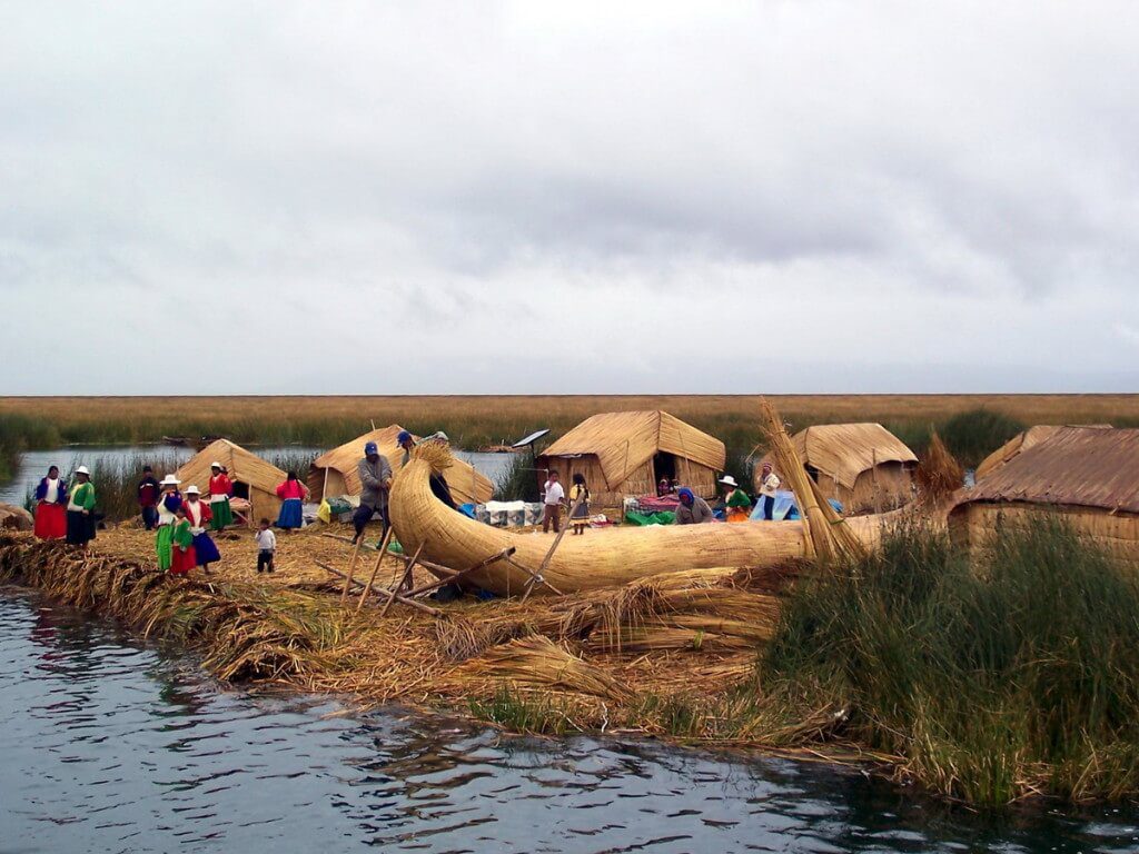 reed boat construction, floating island, lake titicaca, peru