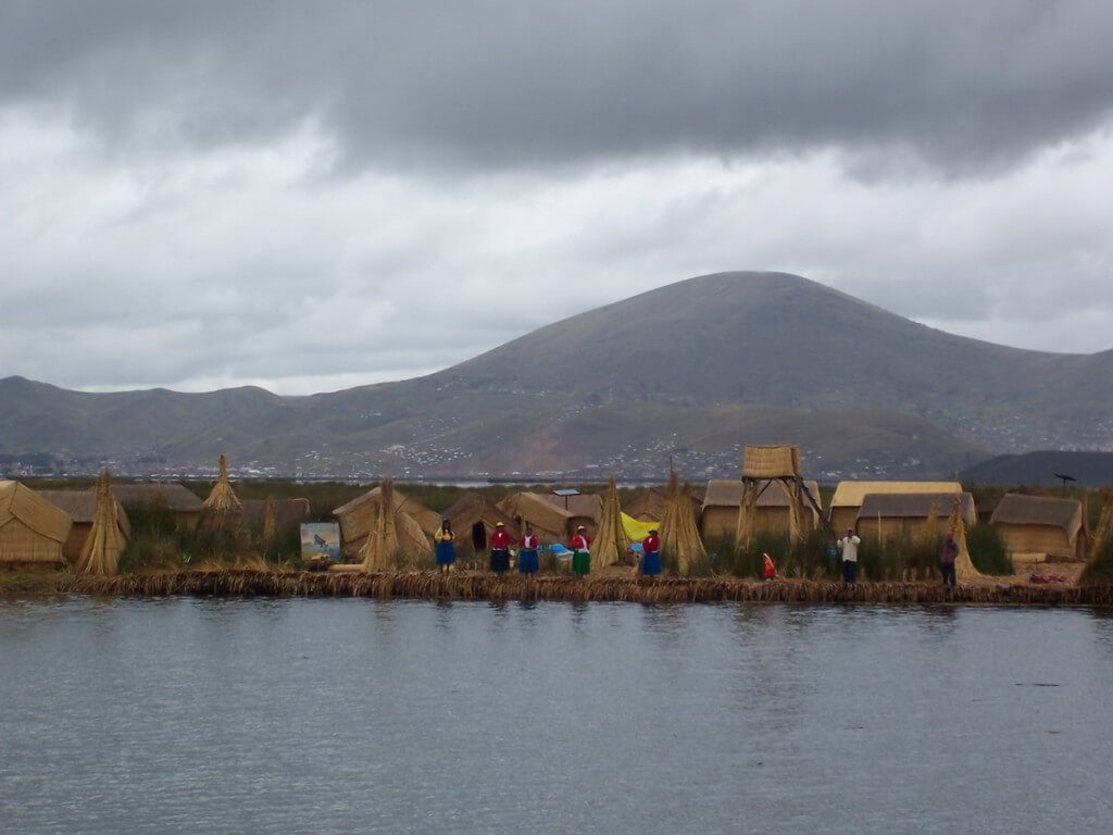Uros village on a totora reed floating island on Lake Titicaca in Peru, South America