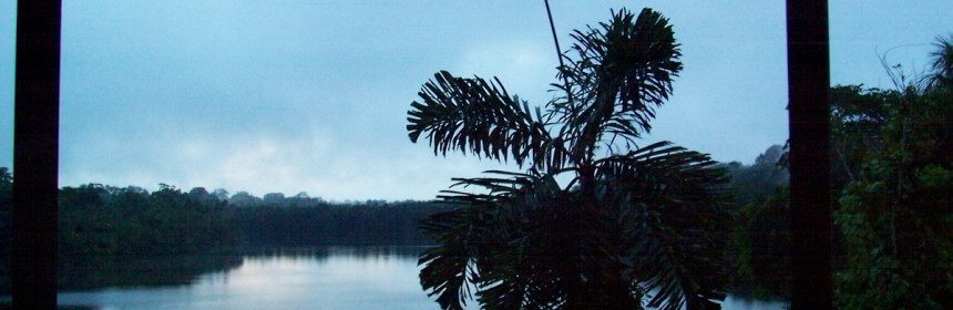 photograph of sunset at Lake Sandoval, Amazon Basin, Peru, South America.