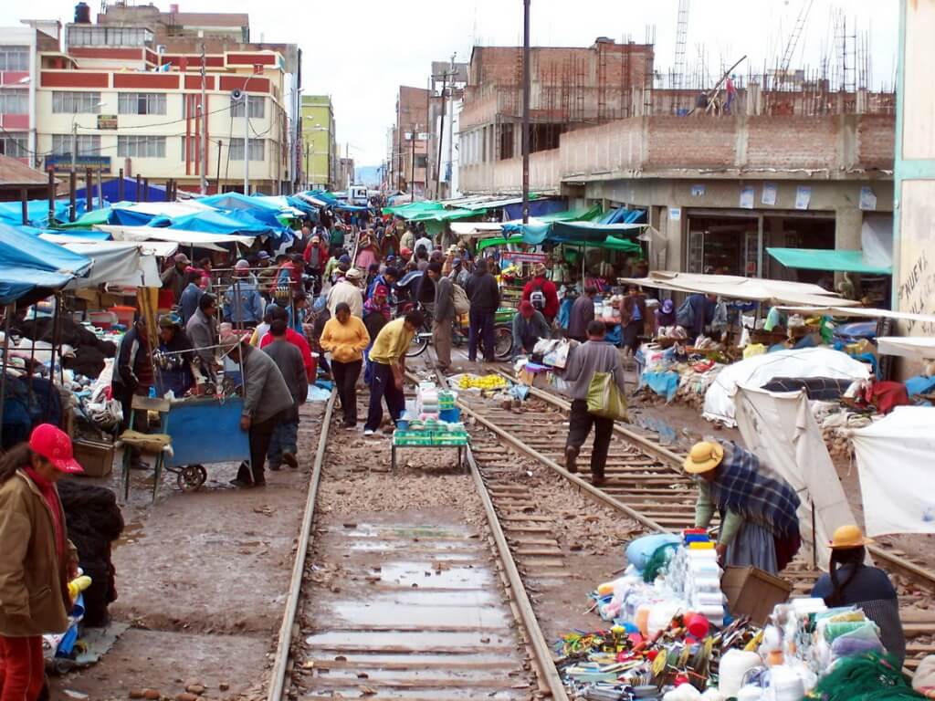 photograph of a street market on the railway tracks in Juliaca, Peru.