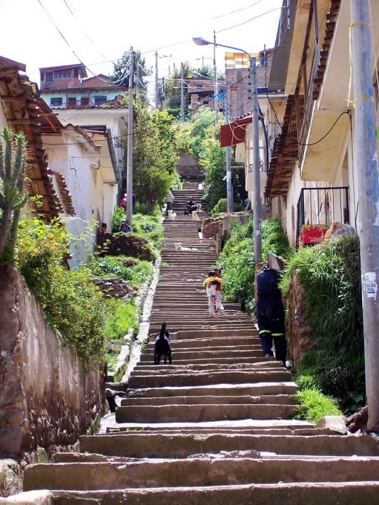 a steep, busy stairway, cusco, peru