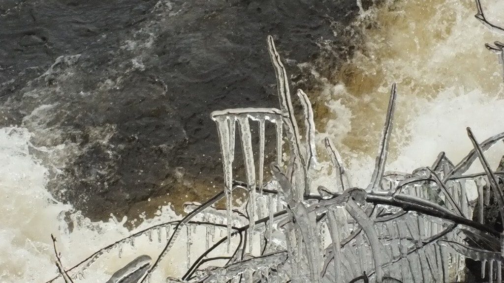 Marsh's Falls flooding - icicles above raging water - Oxtongue river - April 20 2013
