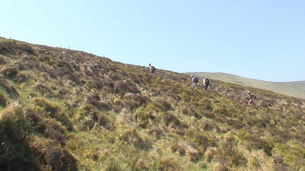 Climbing up Lugduff Mountain - wicklow mountains national park - ireland