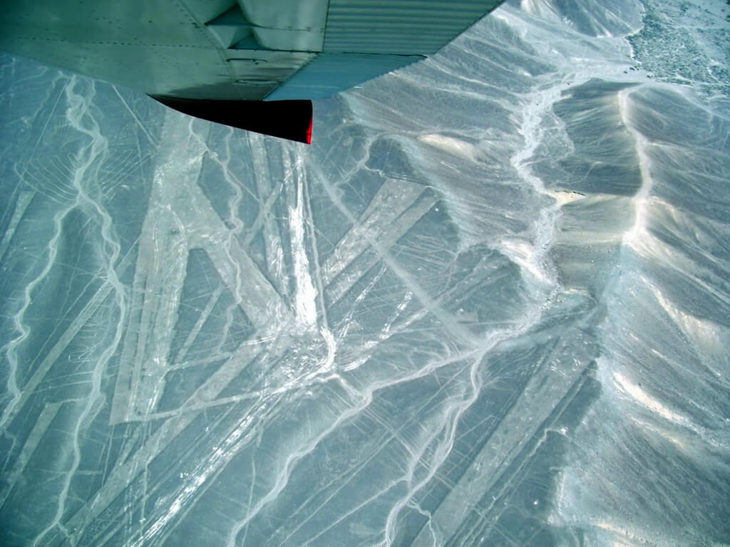 Aerial view from an aircraft of line drawings at the Nazca Lines of Peru, South America