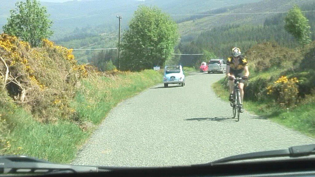 biker and traffic on country road - Enniskerry - Wicklow - Ireland