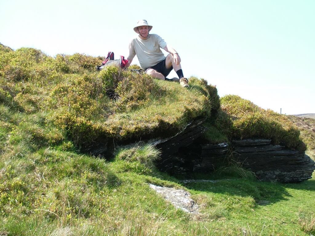 bob sits along the spinc hiking trail - wicklow mountains national park - ireland