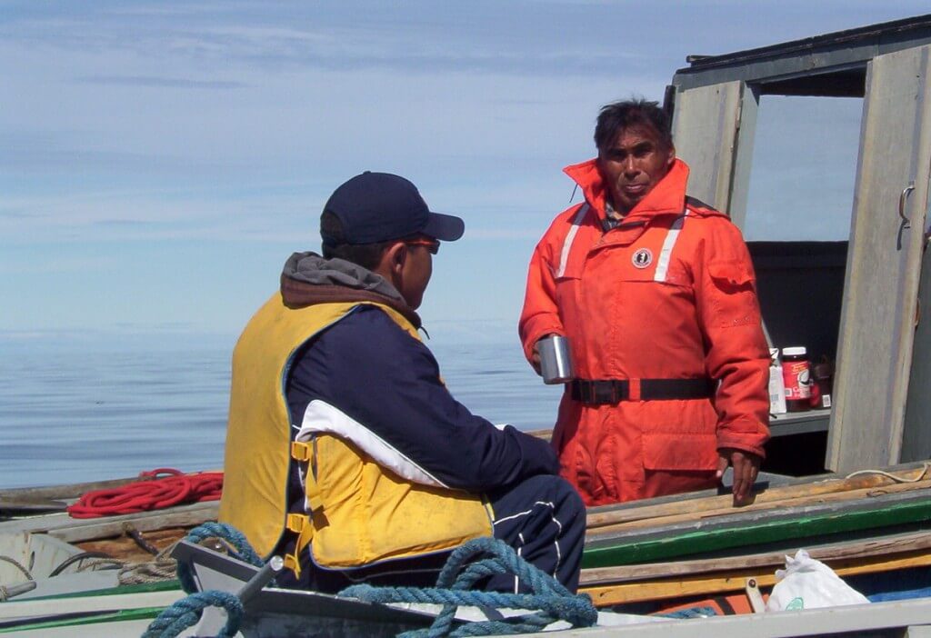 inuit drinking hot water - off baffin island - nunavut - canada
