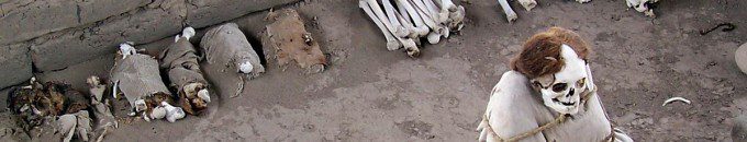 Human Mummified body and skulls and bones at the Chauchilla Cemetery in Peru, South America