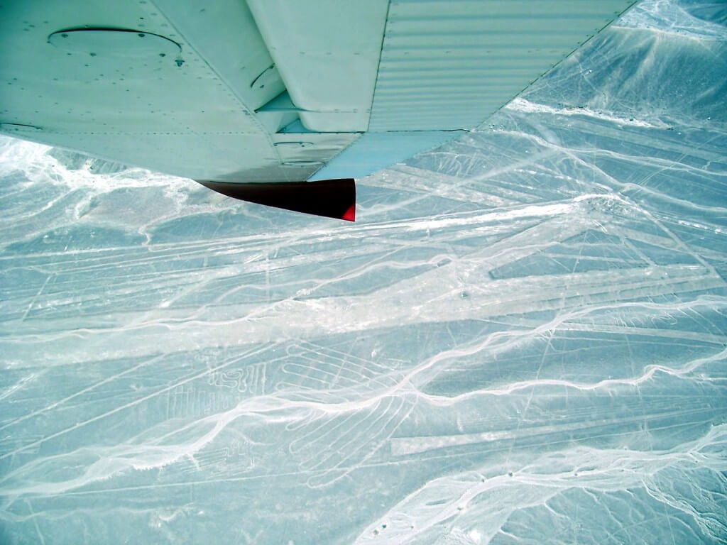 Aerial view from an aircraft of the various line drawings at the Nazca Lines of Peru, South America