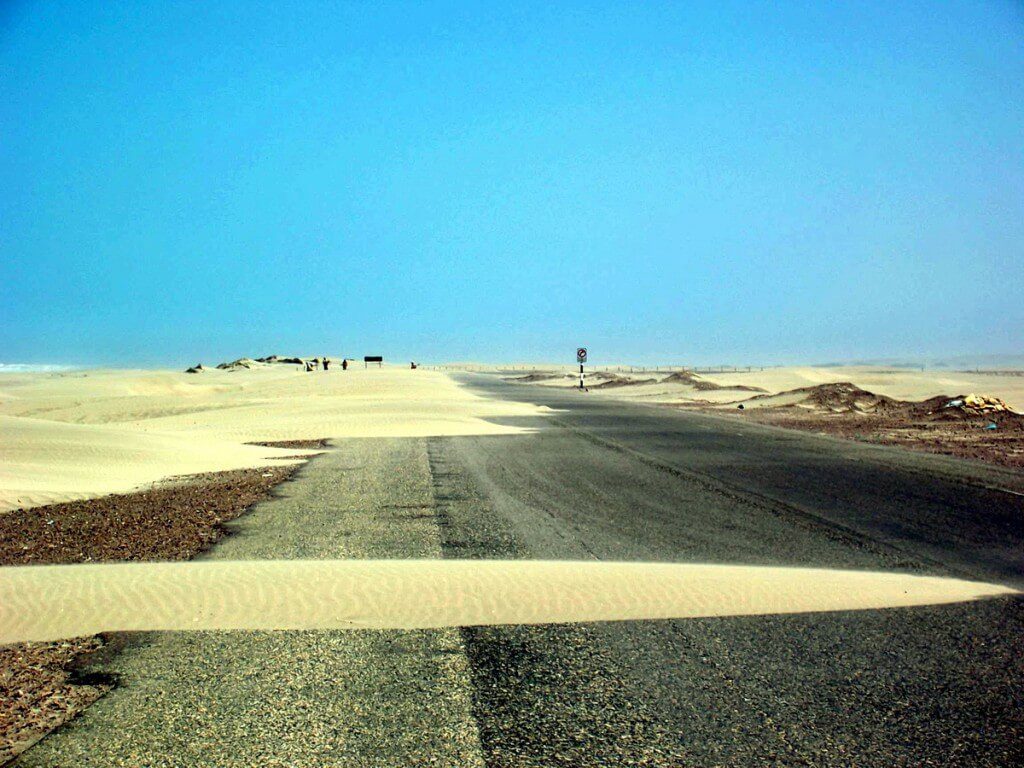 sand over pan american highway in peru - frame to frame