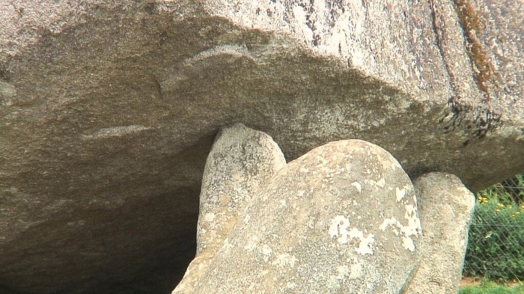 A closeup image of the stones that support the capstone of the Brownshill Portal Tomb in County Carlow, Ireland. Photography by Frame To Frame - Bob and Jean