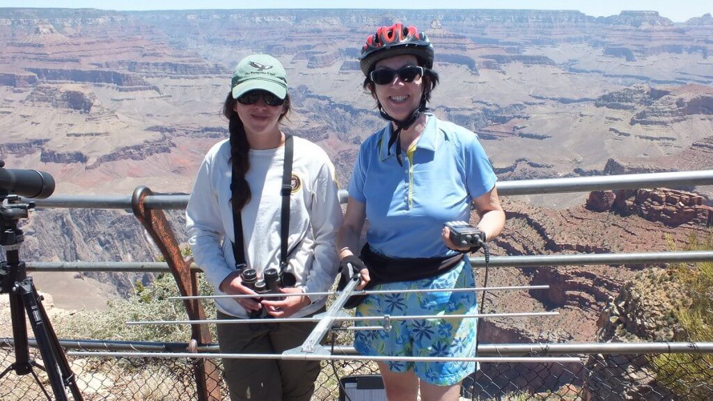 Jean holds Condor audio listening device at hopi point - grand canyon