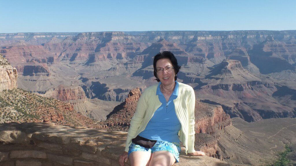 jean sitting on the south rim- grand canyon national park