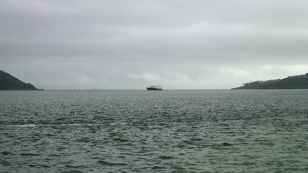 titanic's last anchorage spot, middle of picture where launch boat is located, off cobh town, county cork, ireland