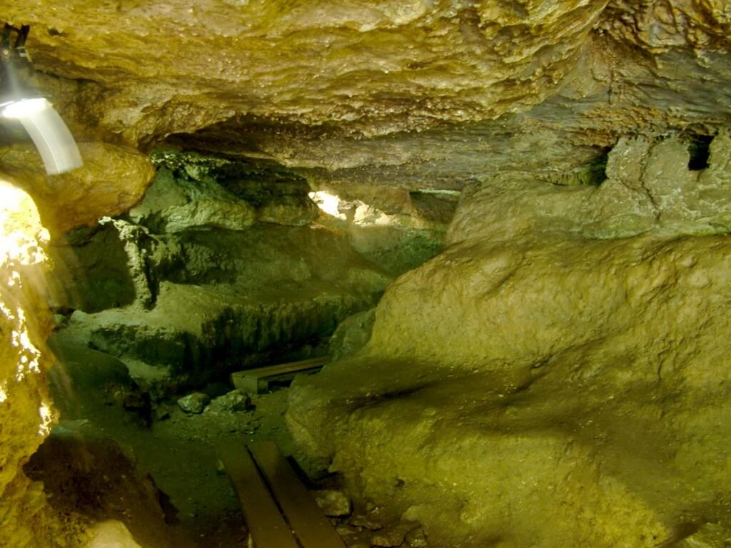 An image of the tunnel leading to Badgers Cave at Blarney Castle in Ireland. Photography by Frame To Frame - Bob and Jean.