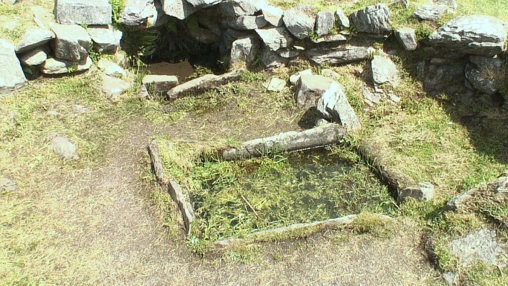 An image of the Fulacht Fiadh cooking site near the Drombeg Stone Circle in County Cork, Ireland. Photography by Frame To Frame - Bob and Jean.