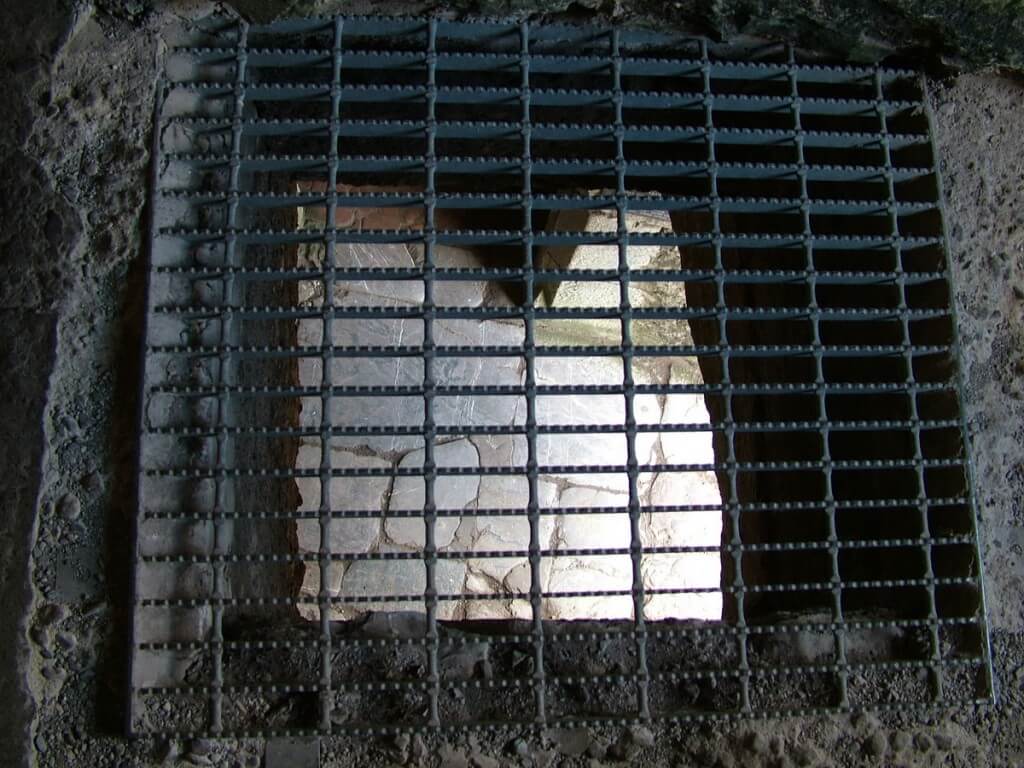 An image of the murder hole inside Blarney Castle near Cork in Ireland. Photography by Frame To Frame - Bob and Jean.