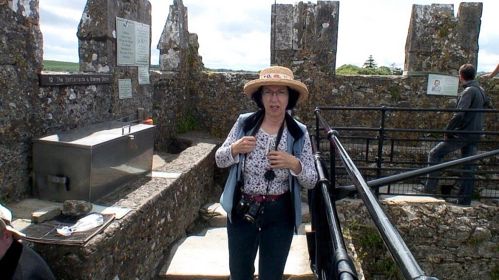 jean arrives at the blarney stone, blarney castle, ireland