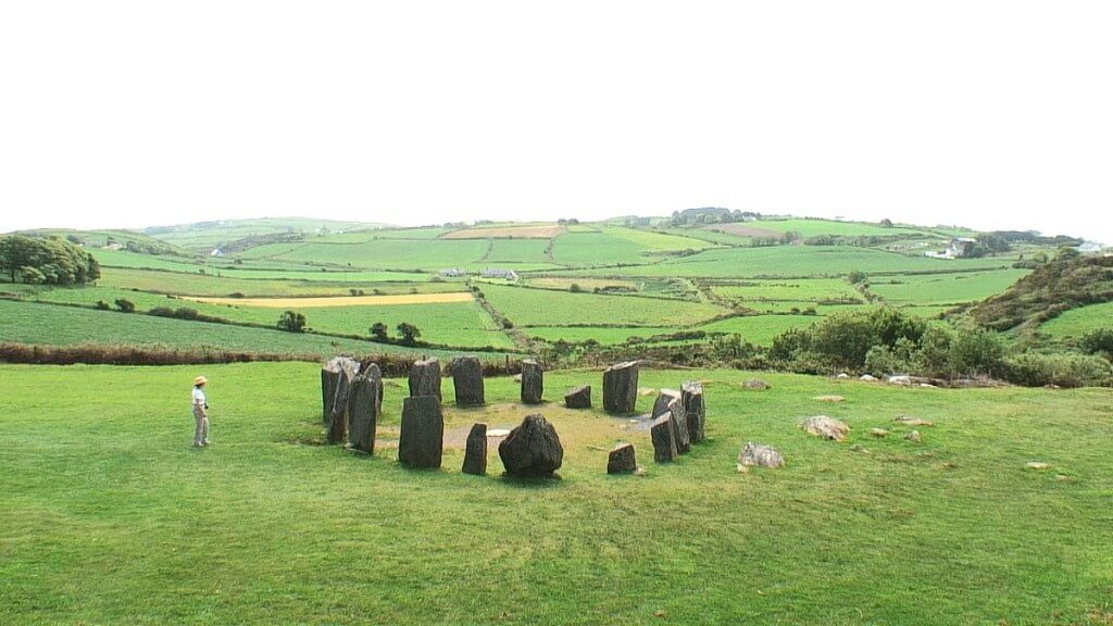 An image of Jean standing beside the Drombeg Stone Circle near Glandore in County Cork in Ireland. Photography by Frame To Frame - Bob and Jean.