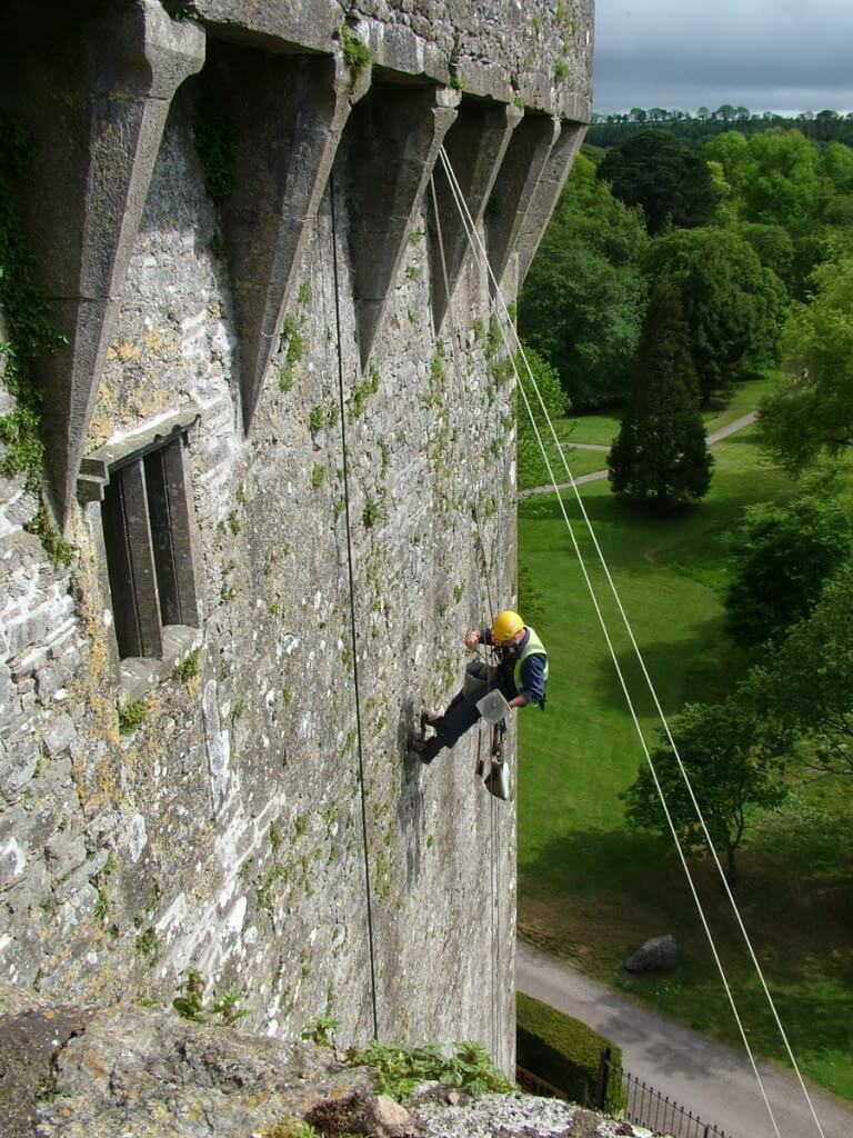 Kissing the Blarney Stone at Blarney Castle, Ireland