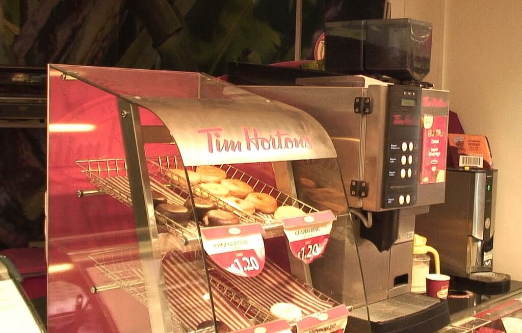 Tim Hortons donuts and coffee counter in Spar store in Ennistymon, County Clare, Ireland