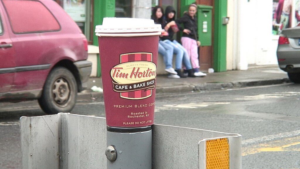 Tim Hortons coffee cup on metal post in Ennistymon, County Clare, Ireland