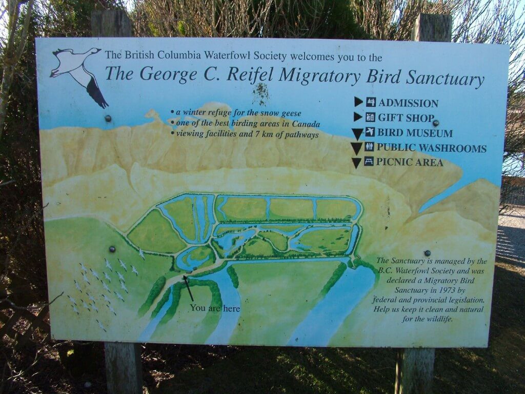 Entrance sign and map at Reifel Migratory Bird Sanctuary in Delta, BC, Canada.