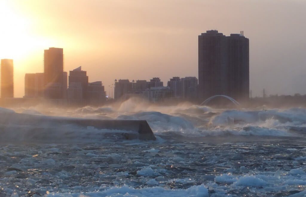 Icy waves breaking on Lake Ontario at Toronto, Ontario, Canada