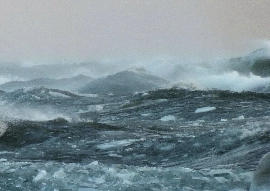 Icy waves on Lake Ontario off Sunnyside in Toronto, Ontario, Canada