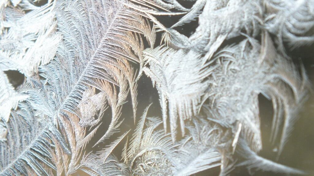 frost forms on a window pane - toronto 5