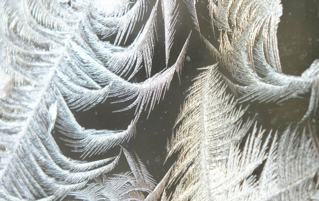 frost forms on a window pane - toronto 6