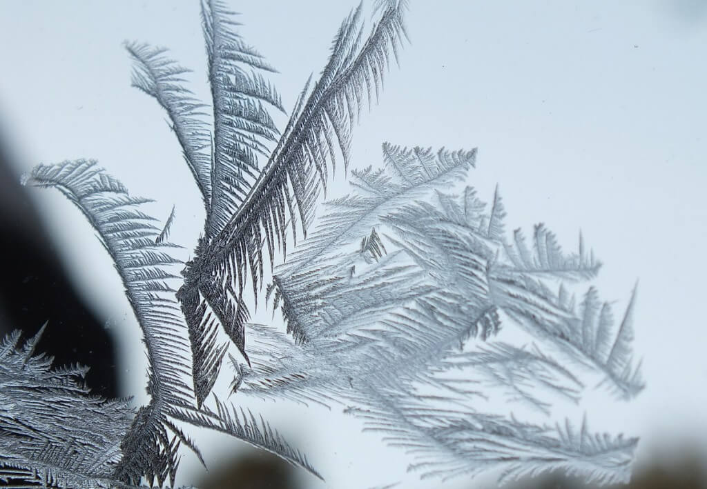 frost forms on a window pane - toronto 8