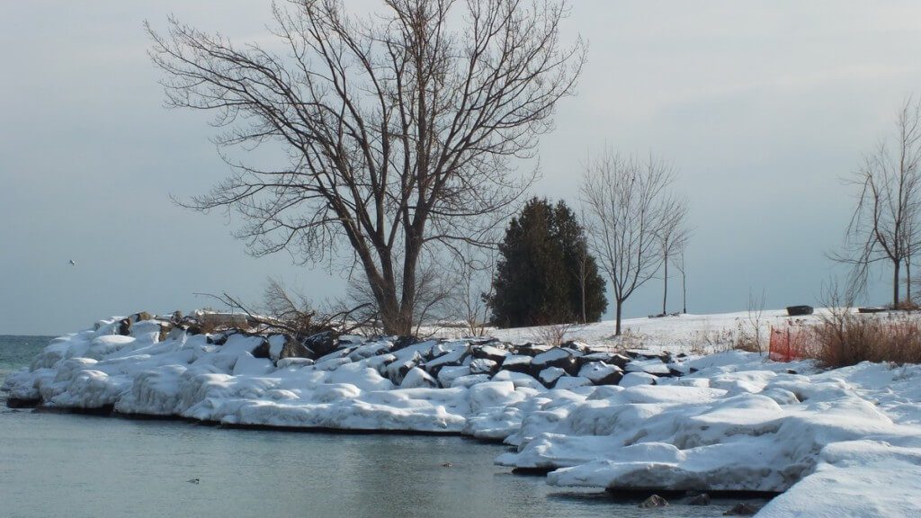 icy shoreline at bluffers park - toronto - ontario
