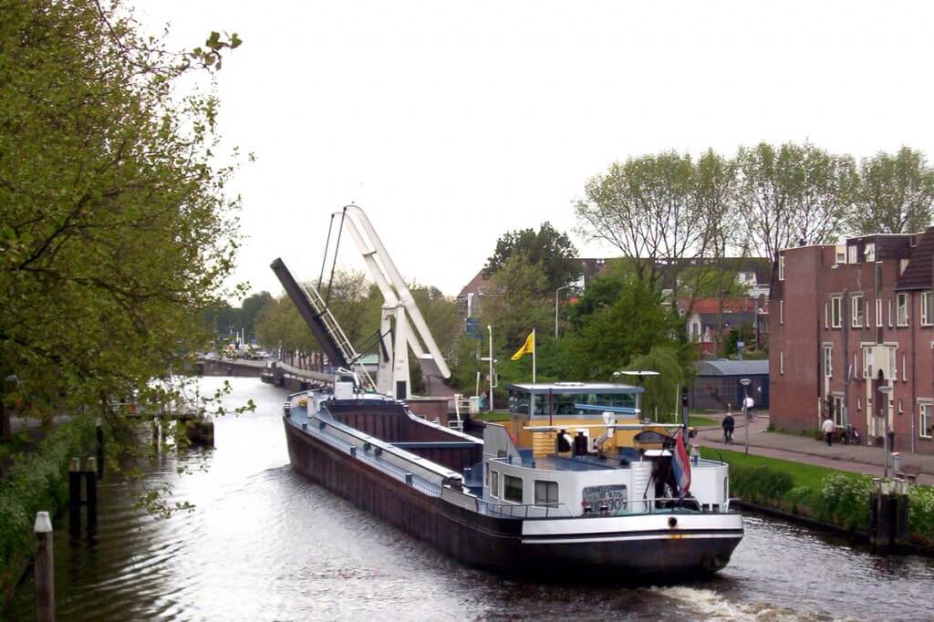 ship on canal, delft, the netherlands