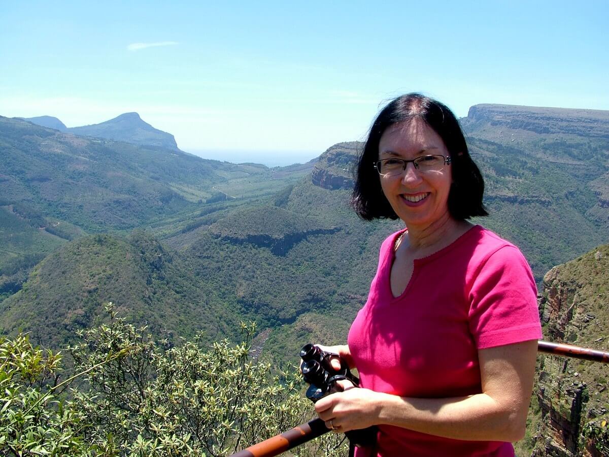 Jean at Drakensberg Escarpment lookout, in South Africa Jean at Drakensberg Escarpment lookout, in South Africa