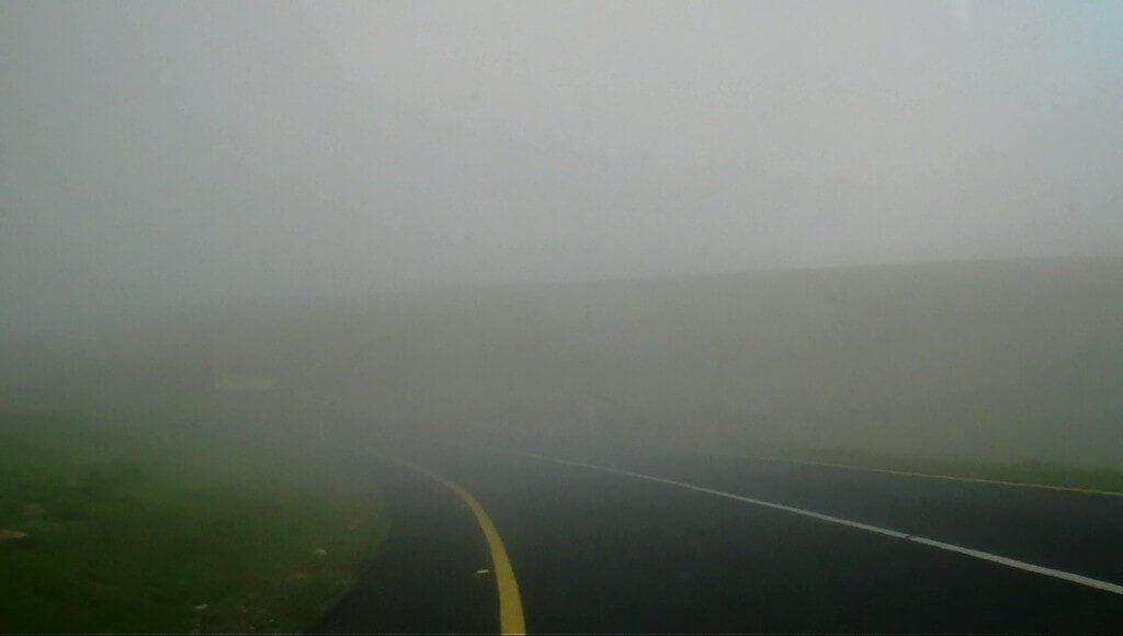 Fog over roadway near Sabie, South Africa