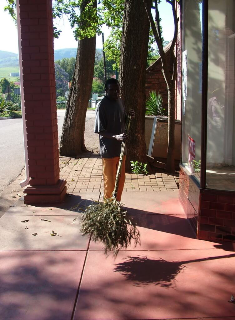 Sidewalk cleaner in Sabie, South Africa