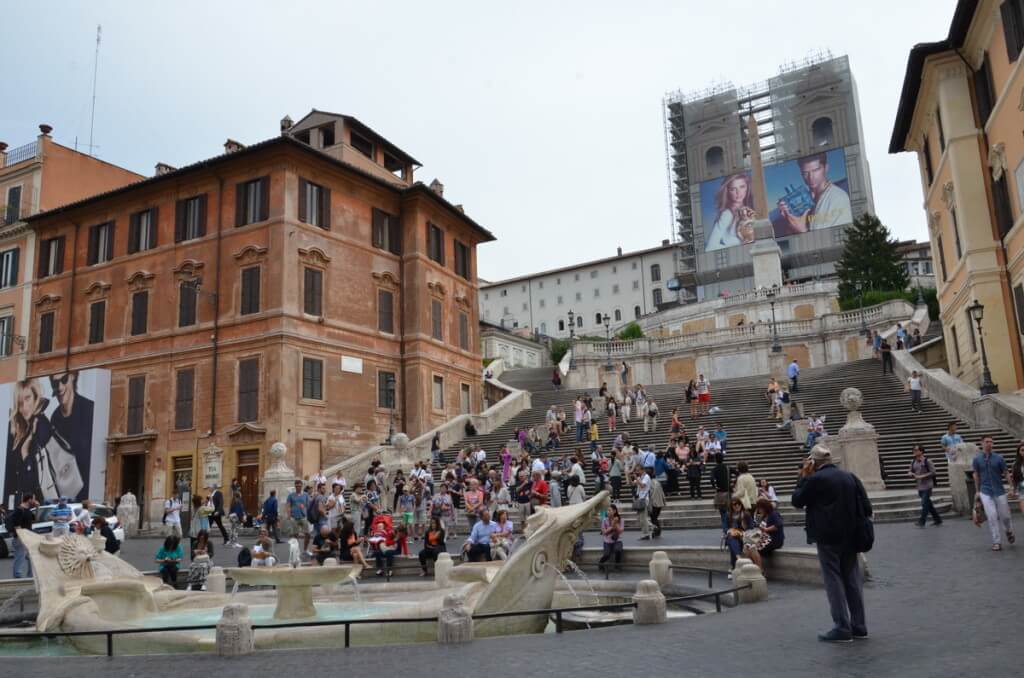 Fontana della Barcaccia (Fountain of the Ugly Boat) at the bottom of the Spanish Steps in Rome, Italy