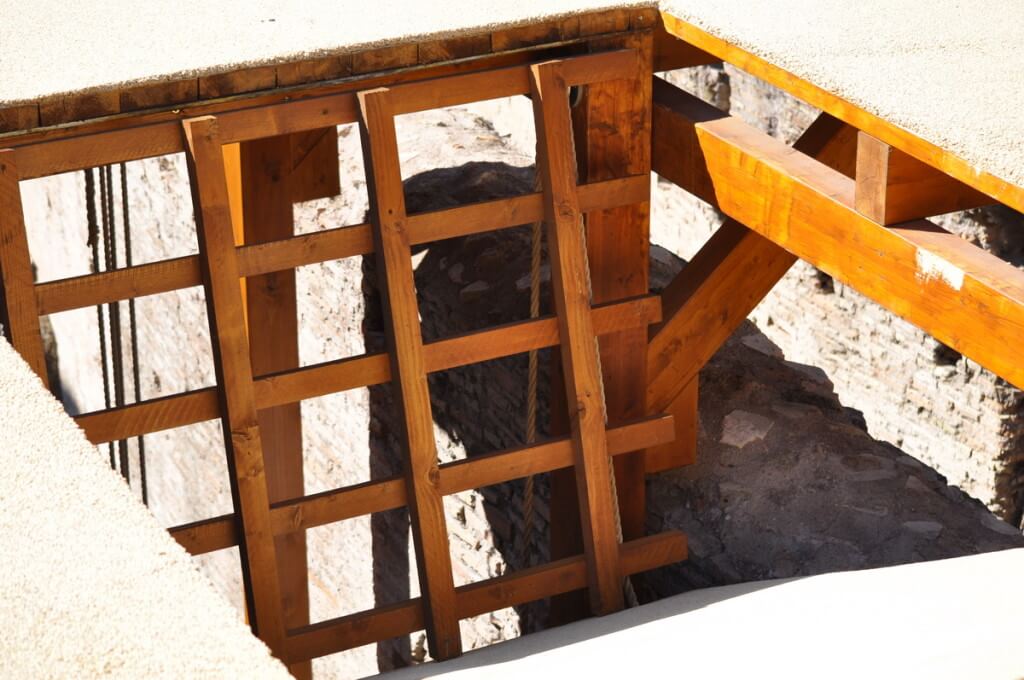 An image of the reconstructed trap door in the floor of the Roman Colosseum, Rome, Italy. Photography by Frame To Frame - Bob and Jean.