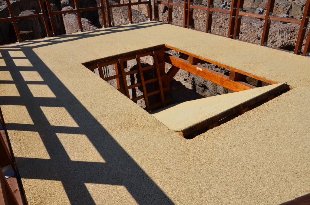 An image of the reconstructed trap door in wooden floor of the Roman Colosseum in Rome, Italy. Photography by Frame To Frame - Bob and Jean.