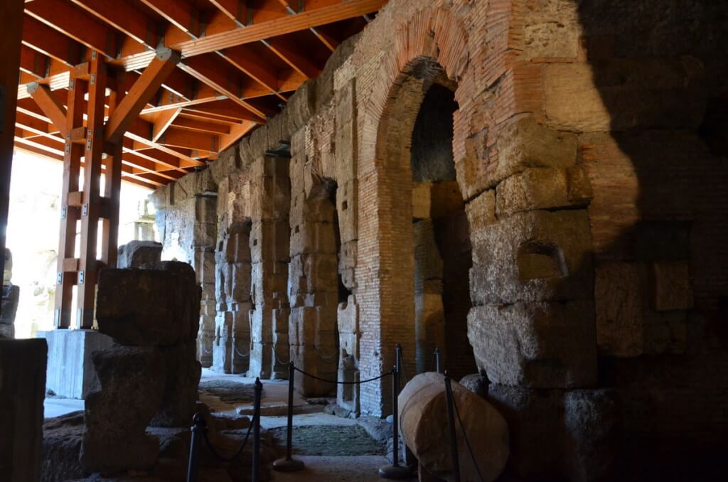 An image of the restored wooden floor and brick walls in the basement of the Roman Colosseum, Rome, Italy. Photography by Frame To Frame - Bob and Jean.