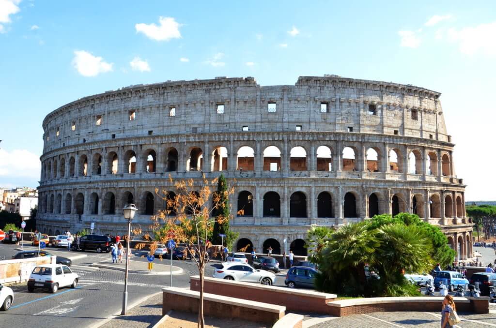 A wide angle street view of the Colosseum in Rome, Italy. Photography by Frame To Frame - Bob and Jean.