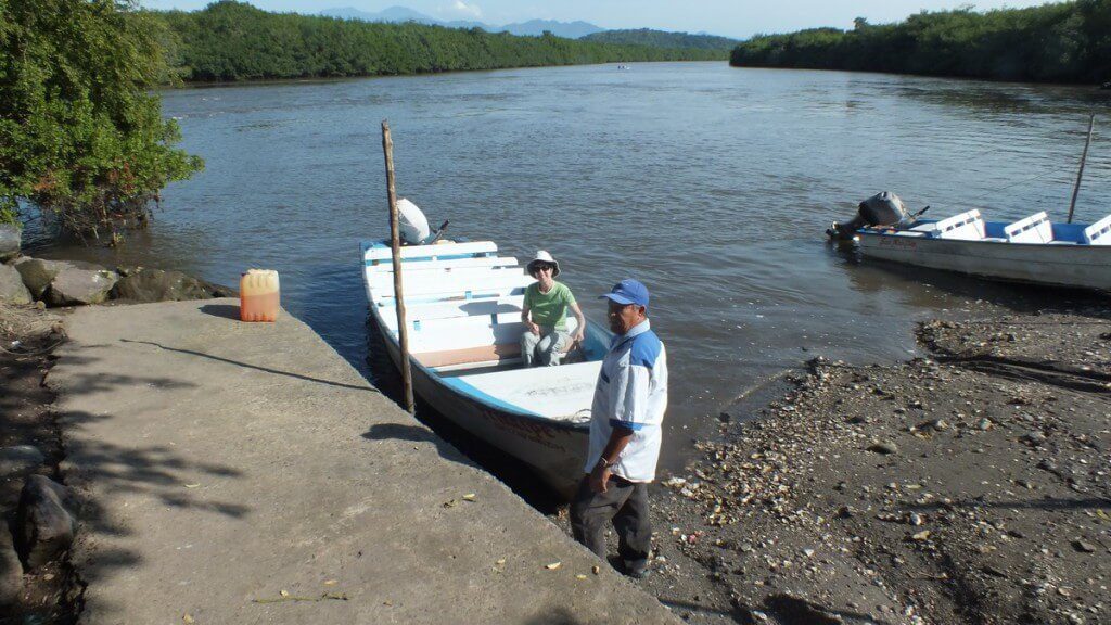 Boarding a boat in San Blas for ride through the mangrove swamp, Mexico