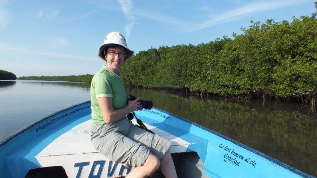 Photo of Jean aboard a boat on the San Cristobal River near San Blas, Mexico