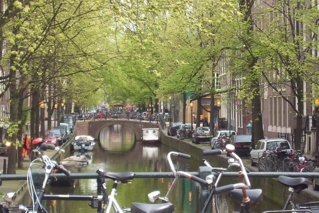 bikes on a bridge in amsterdam, the netherlands
